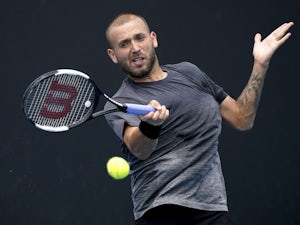US Open: Dan Evans continues British success to reach second round
