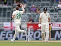 South Africa's Anrich Nortje celebrates taking the wicket of England's Joe Root on January 25, 2020