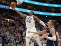 Utah Jazz guard Donovan Mitchell (45) lifts the ball to the basket during the fourth quarter against the Dallas Mavericks at Vivint Smart Home Arena on January 26, 2020