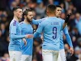 Manchester City's Bernardo Silva celebrates scoring their second goal with teammates on January 26, 2020