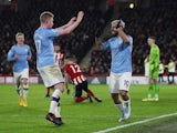 Manchester City's Sergio Aguero celebrates scoring their first goal with Kevin De Bruyne on January 21, 2020
