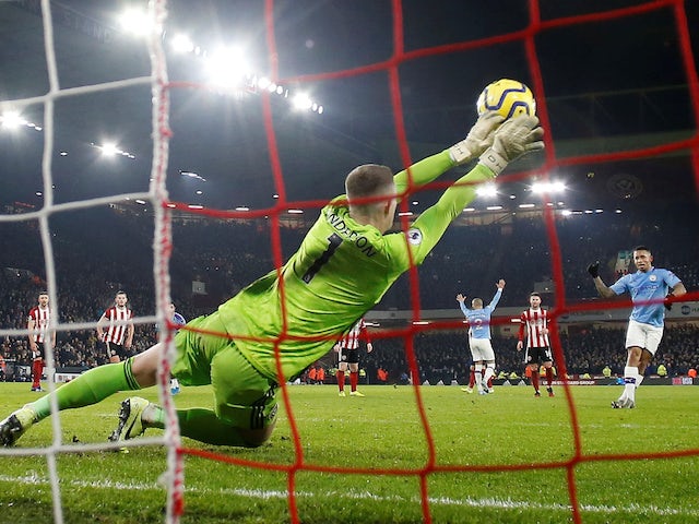 Sheffield United's Dean Henderson saves a penalty from Manchester City's Gabriel Jesus on January 21, 2020