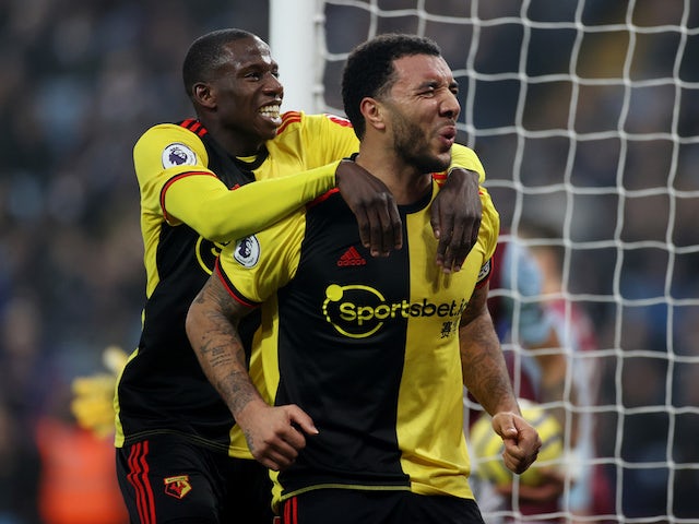 Watford's Troy Deeney celebrates scoring their first goal with Abdoulaye Doucoure on January 21, 2020