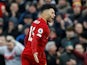 Alex Oxlade-Chamberlain celebrates opening the scoring for Liverpool on February 1, 2020