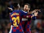 Barcelona's Anssumane 'Ansu' Fati celebrates scoring their first goal with Lionel Messi on February 2, 2020