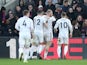 Sheffield United players celebrate their first goal on February 1, 2020