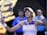 Spain's Garbine Muguruza celebrates winning her match against Romania's Simona Halep on January 30, 2020
