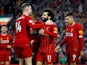 Liverpool's Mohamed Salah celebrates scoring their third goal with Jordan Henderson and teammates on February 1, 2020