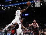 Brooklyn Nets guard Kyrie Irving (11) moves to the basket against Chicago Bulls forward Chandler Hutchison (15) during the second half at Barclays Center on February 1, 2020