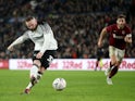 Derby County's Wayne Rooney scores their fourth goal from the penalty spot on February 4, 2020