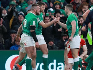 Ireland secure bonus-point win over Wales to go top of Six Nations standings