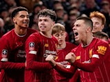 Liverpool's Neco Williams celebrates with team mates after Shrewsbury Town's Ro-Shaun Williams scored an own goal and the first for Liverpool on February 4, 2020
