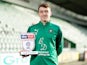Luke Jephcott poses with his League Two Player of the Month award for January 2020