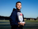 Nahki Wells poses with his Championship Player of the Month award for January 2020
