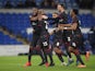 Reading's Sone Aluko celebrates with team mates after winning the penalty shootout on February 4, 2020