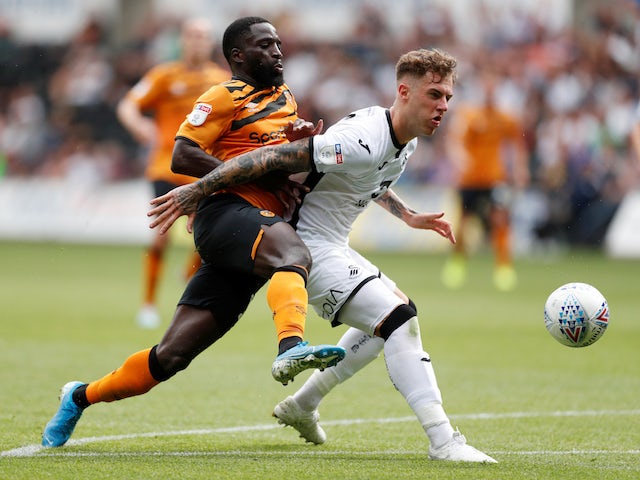 Swansea City's Joe Rodon in action with Hull City's Nouha Dicko in the Championship on August 3, 2019