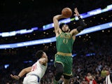 Boston Celtics forward Jayson Tatum (0) prepares to dunk over Los Angeles Clippers point guard Landry Shamet (20) during the second half at TD Garden on February 14, 2020