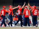 England's Ben Stokes celebrates the wicket of South Africa's Rassie van der Dussen with teammates on February 12, 2020