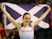Great Britain's Laura Muir celebrates winning the 1000 Metres Women's Final with flag on February 15, 2020