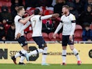 Luton Town's Ryan Tunnicliffe celebrates scoring their first goal with teammates on February 15, 2020