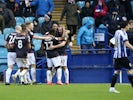 Reading's George Puscas celebrates scoring their second goal with teammates on February 15, 2020