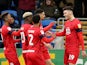 Wigan Athletic's Kiefer Moore celebrates scoring their first goal with teammates on February 15, 2020