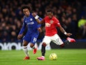 Chelsea's Willian in action with Manchester United's Fred in the Premier League on February 17, 2020