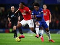 Chelsea's Willian in action with Manchester United's Anthony Martial in the Premier League on February 17, 2020