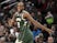 Milwaukee Bucks forward Khris Middleton (22) reacts after making a three point shot during the second half Washington Wizards at Capital One Arena on February 25, 2020