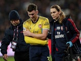 Arsenal's Kieran Tierney is substituted after sustaining a shoulder injury in December 2019