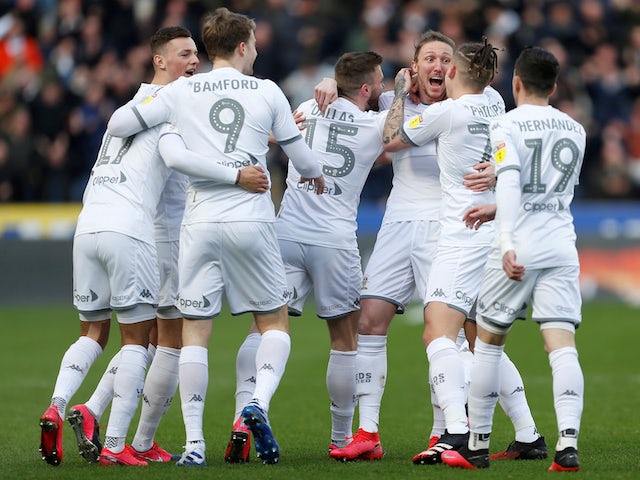 Leeds United's Luke Ayling celebrates with teammates after he scores their first goal on February 29, 2020