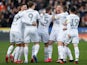Leeds United's Luke Ayling celebrates with teammates after he scores their first goal on February 29, 2020