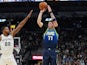Dallas Mavericks guard Luka Doncic (77) shoots over San Antonio Spurs forward Rudy Gay (22) in the second half at the AT&T Center on February 27, 2020