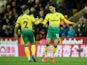 Norwich City's Jamal Lewis celebrates scoring their first goal with Max Aarons on February 28, 2020