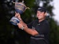Patrick Reed poses with the winner's trophy following the final round of the WGC - Mexico Championship golf tournament at Club de Golf Chapultepec on February 24, 2020