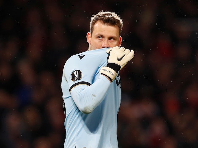Club Brugge's Simon Mignolet looks dejected after Manchester United's Odion Ighalo scores their second goal on February 27, 2020