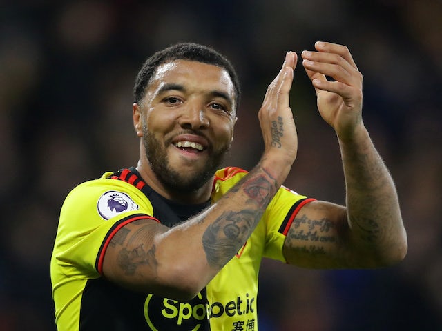 Watford's Troy Deeney applauds fans as he celebrates at the end of the match on February 29, 2020