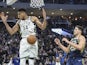 Milwaukee Bucks forward Giannis Antetokounmpo (34) reacts after dunking against Indiana Pacers forward Doug McDermott (20) in the fourth quarter at Fiserv Forum on March 5, 2020