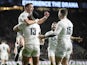 England's Manu Tuilagi celebrates scoring their third try with George Ford and teammates on March 7, 2020