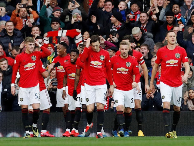 Manchester United's Anthony Martial celebrates scoring their first goal with teammates on March 8, 2020