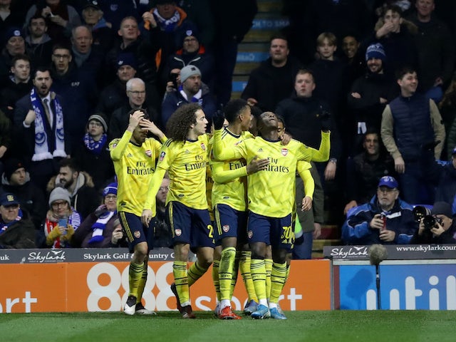 Arsenal's Eddie Nketiah celebrates scoring their second goal with teammates on March 2, 2020