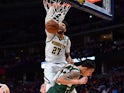Denver Nuggets guard Jamal Murray (27) finishes off a basket over Milwaukee Bucks forward D.J. Wilson (5) in the third quarter at the Pepsi Center on March 10, 2020