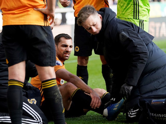 Wolverhampton Wanderers' Jonny receives medical attention after sustaining an injury in February 2020