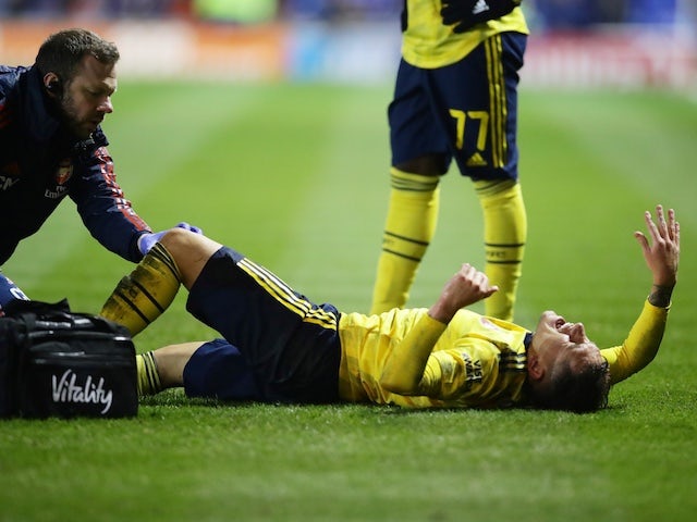 Arsenal's Lucas Torreira reacts after sustaining an injury in March 2020