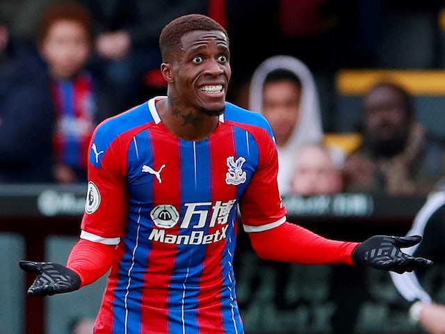 Crystal Palace's Wilfried Zaha reacts on March 7, 2020