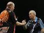 Raymond van Barneveld shakes hands with Phil Taylor after victory in February 2016