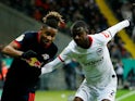  RB Leipzig's Christopher Nkunku in action with Eintracht Frankfurt's Evan Ndicka in February 2020