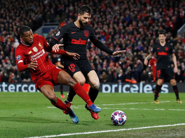 Liverpool's Georginio Wijnaldum in action with Atletico Madrid's Felipe in the Champions League on March 11, 2020