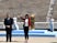 Greece hands Olympic flame over to hosts Japan despite coronavirus concerns
