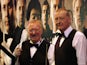 Dennis Taylor and Steve Davis (R) are presented to the audience during the afternoon session in April 2010